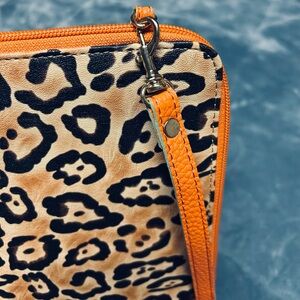 iPad carrier adjustable strap animal print size: 10-1/2” x 8-3/4” x 1 inch